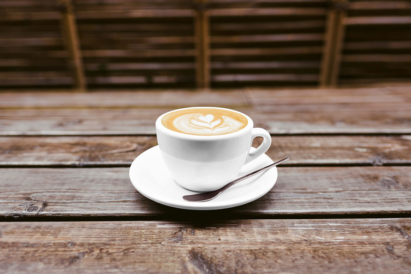 Coffee Cup on Table Mockup – Free PSD Download for Branding & Presentation